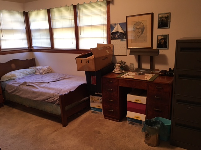 Bedroom cleared and clean after cleanup