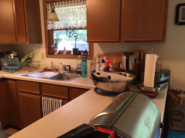 The same kitchen clean and usable after cleanup
